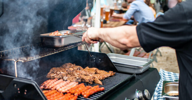 Barbecue grill bbq on propane gas grill steaks bratwurst sausages meat meal gas and propane grills